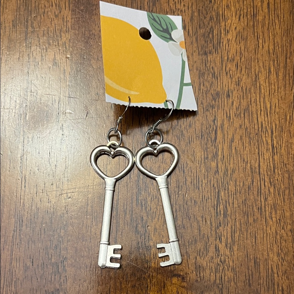 NWT Silver heart shaped key earrings